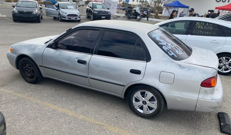 
								Toyota Corolla 2000 full									