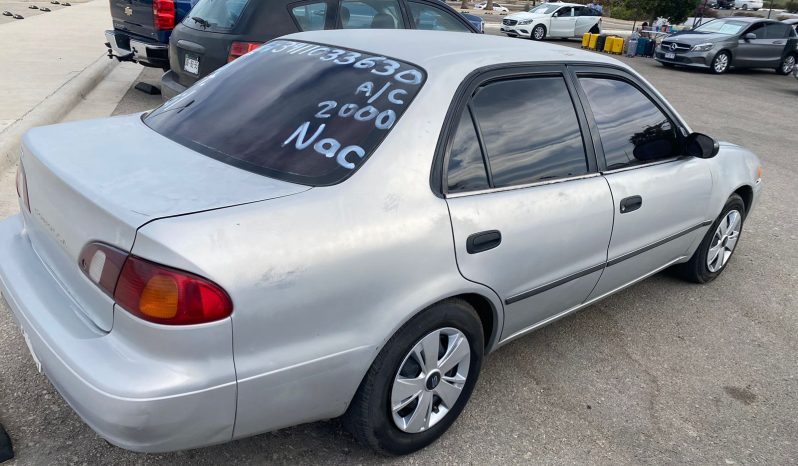 
								Toyota Corolla 2000 full									